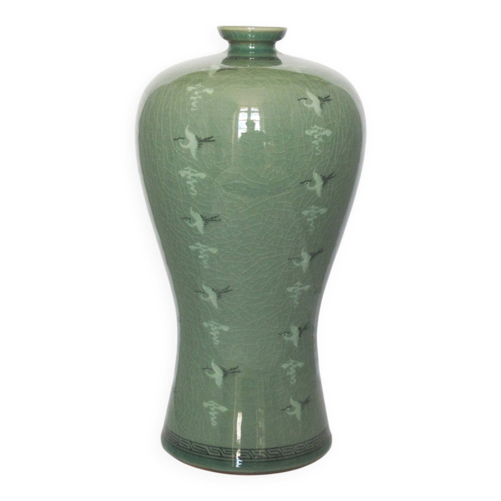 Korean vase in crackled celadon with a pattern of ducks and clouds.