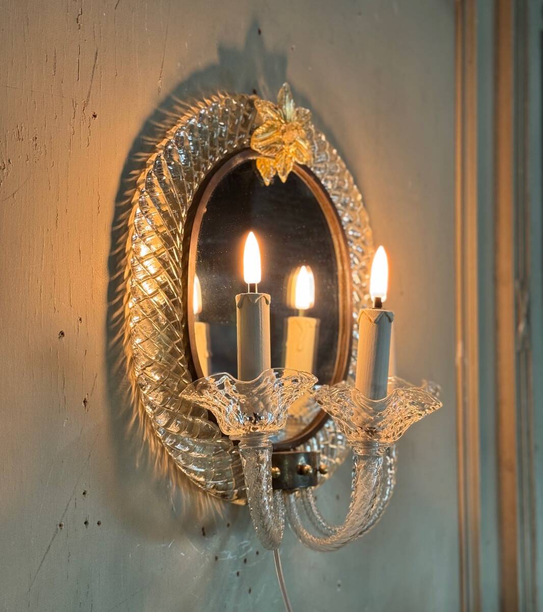 Pair of “trecchia” mirror wall lights, Venice, circa 1950, Murano glass inc.