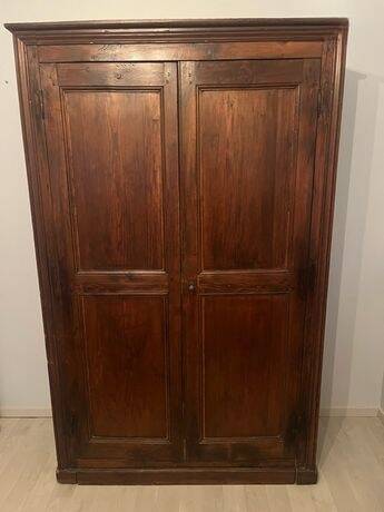 Antique solid wood wardrobe in country/traditional style.