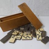 Antique set of dominoes made of bone and wood
