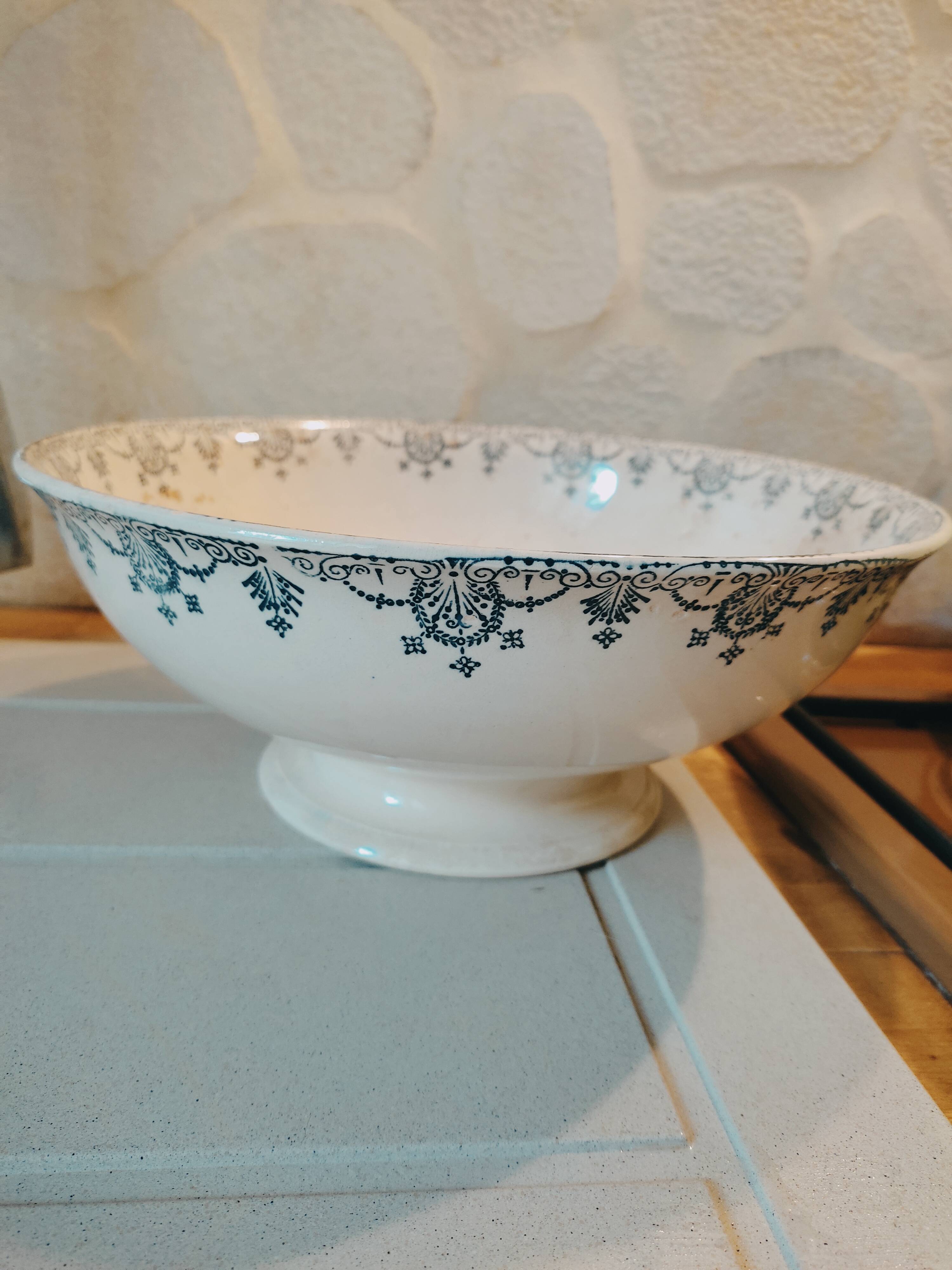 Old bowl in pedestic tiles