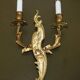 Pair of antique French wall sconces, gilded and bronzed, from the 1920s.