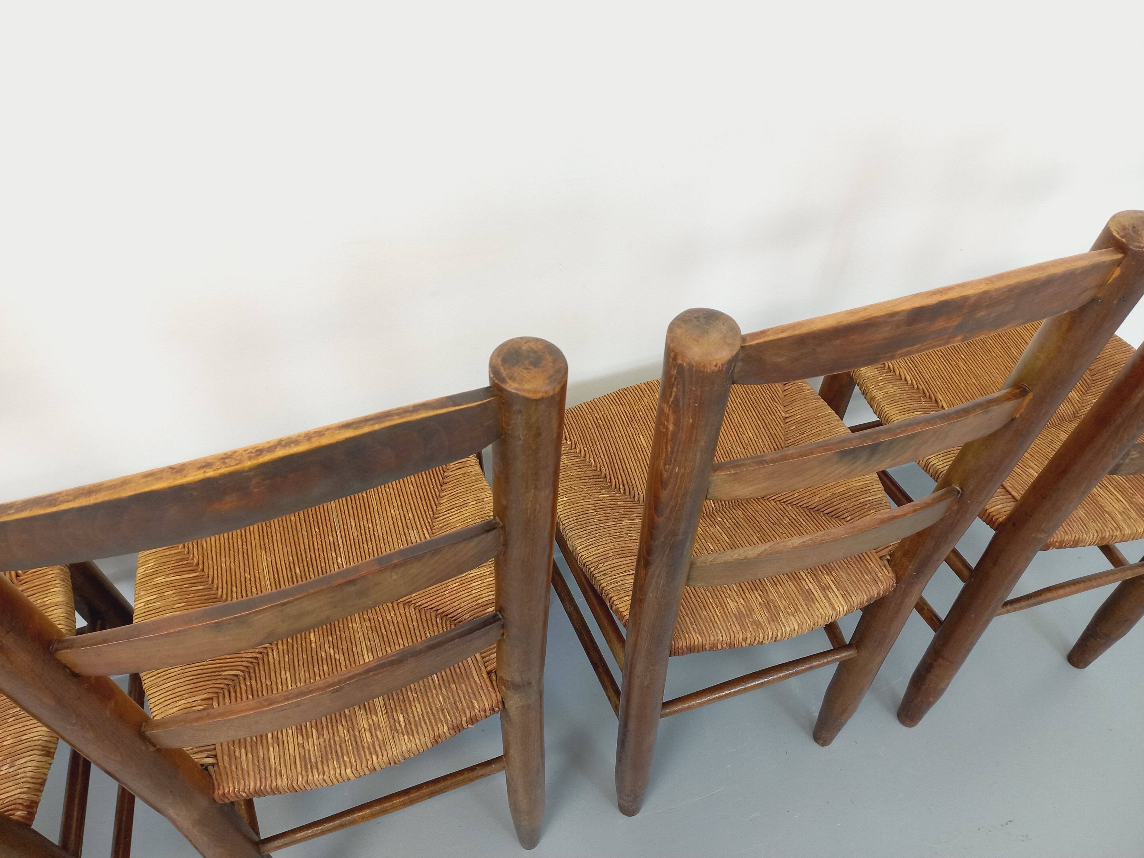 Set of 4 vintage brutalist chairs in wood and straw from the 60s