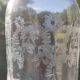 Two antique engraved glass bottles