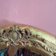 Gold oval mirror refurbished with a pediment — Louis XVI / Napoléon III style