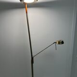 Golden metal floor lamp with reading light