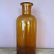 Amber glass vase bottle