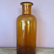 Amber glass vase bottle