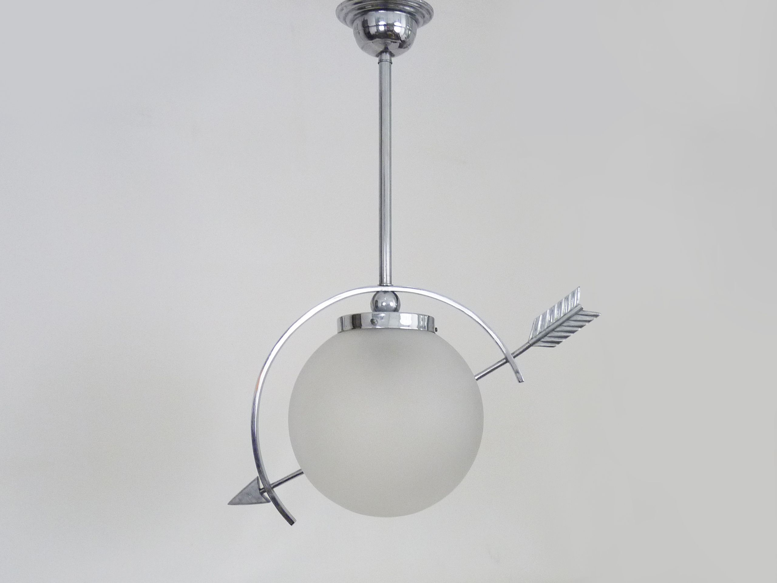 Suspension in chromed metal and glass, space age, arrow crossing a globe. Seventies