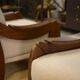Brutalist pair of armchairs in mahogany and cream boucle 1970s.
