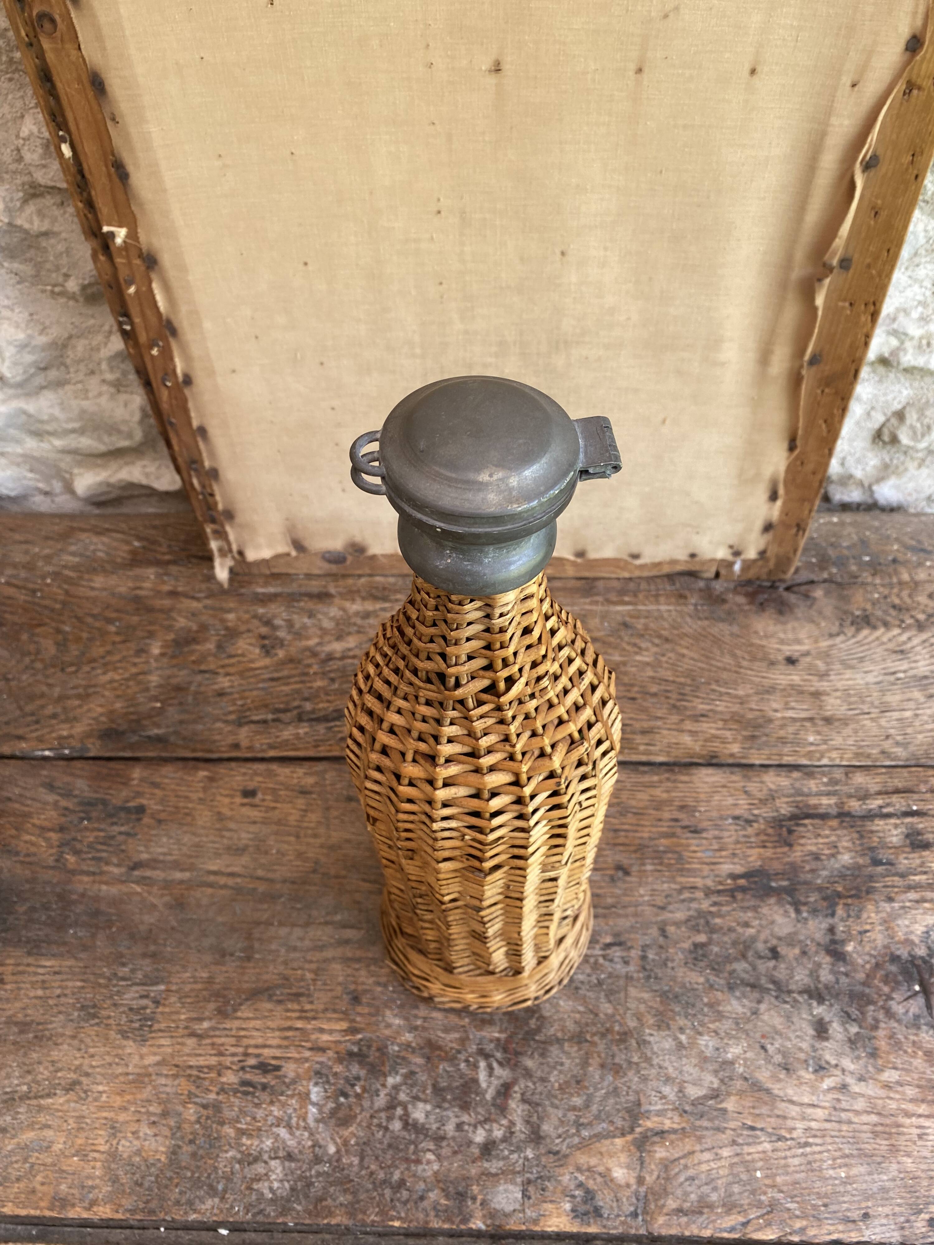 Woven wicker bottle
