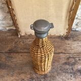 Woven wicker bottle
