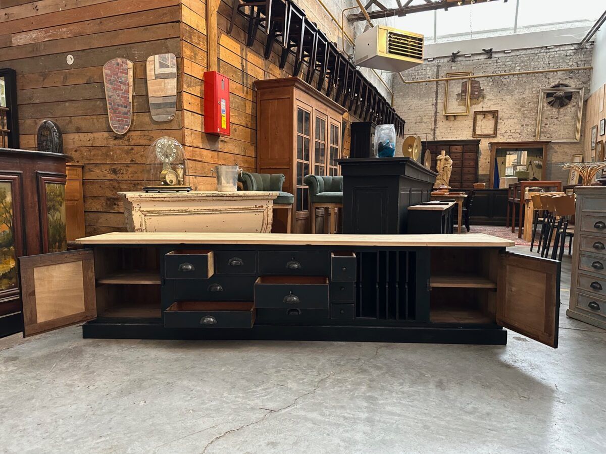 Old workshop furniture transformed into a TV unit.