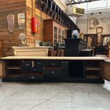 Old workshop furniture transformed into a TV unit.