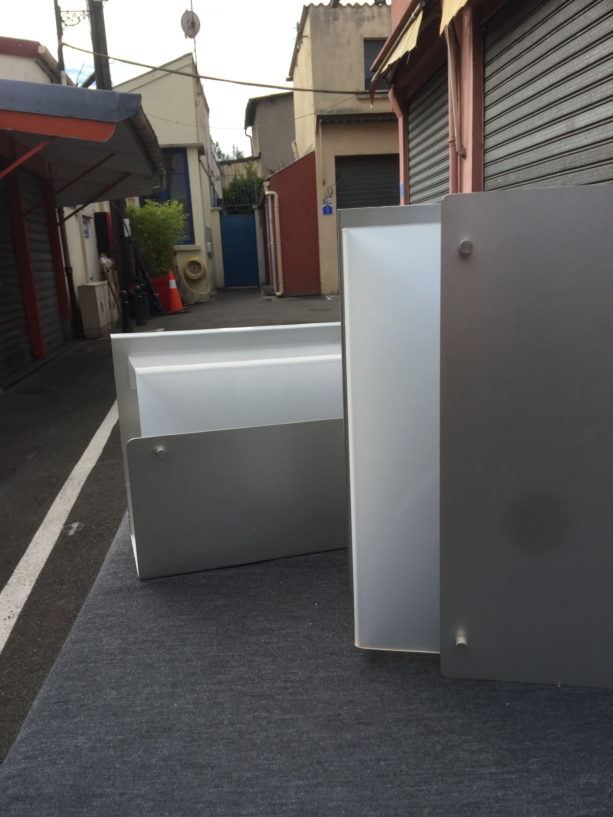 Pair of aluminum and translucent rodohide sconces 1970