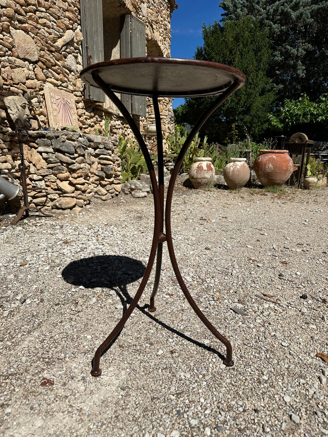 Artisanal wrought iron side table