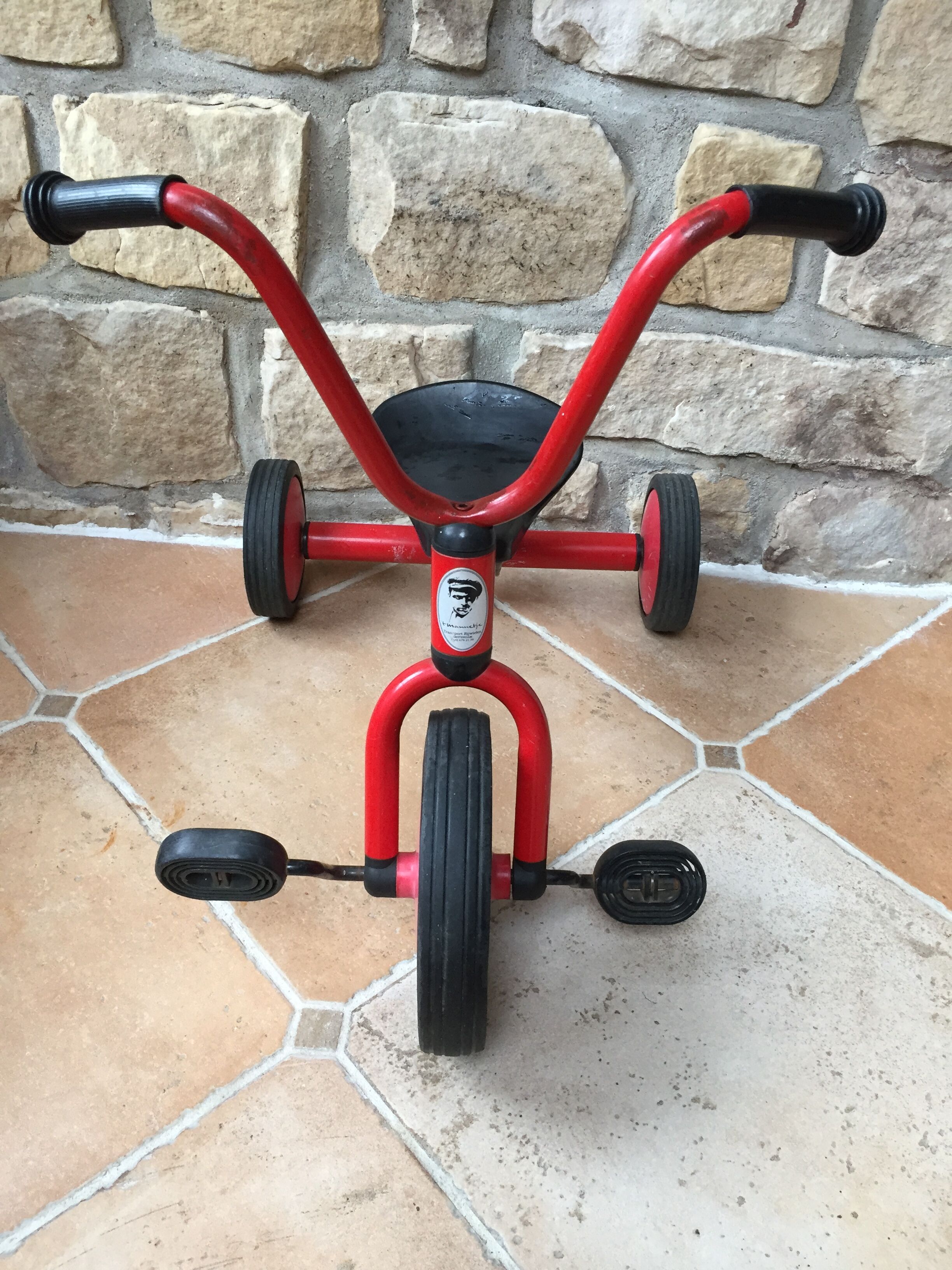 Red child tricycle