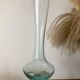 Vintage glass vase in blue tones