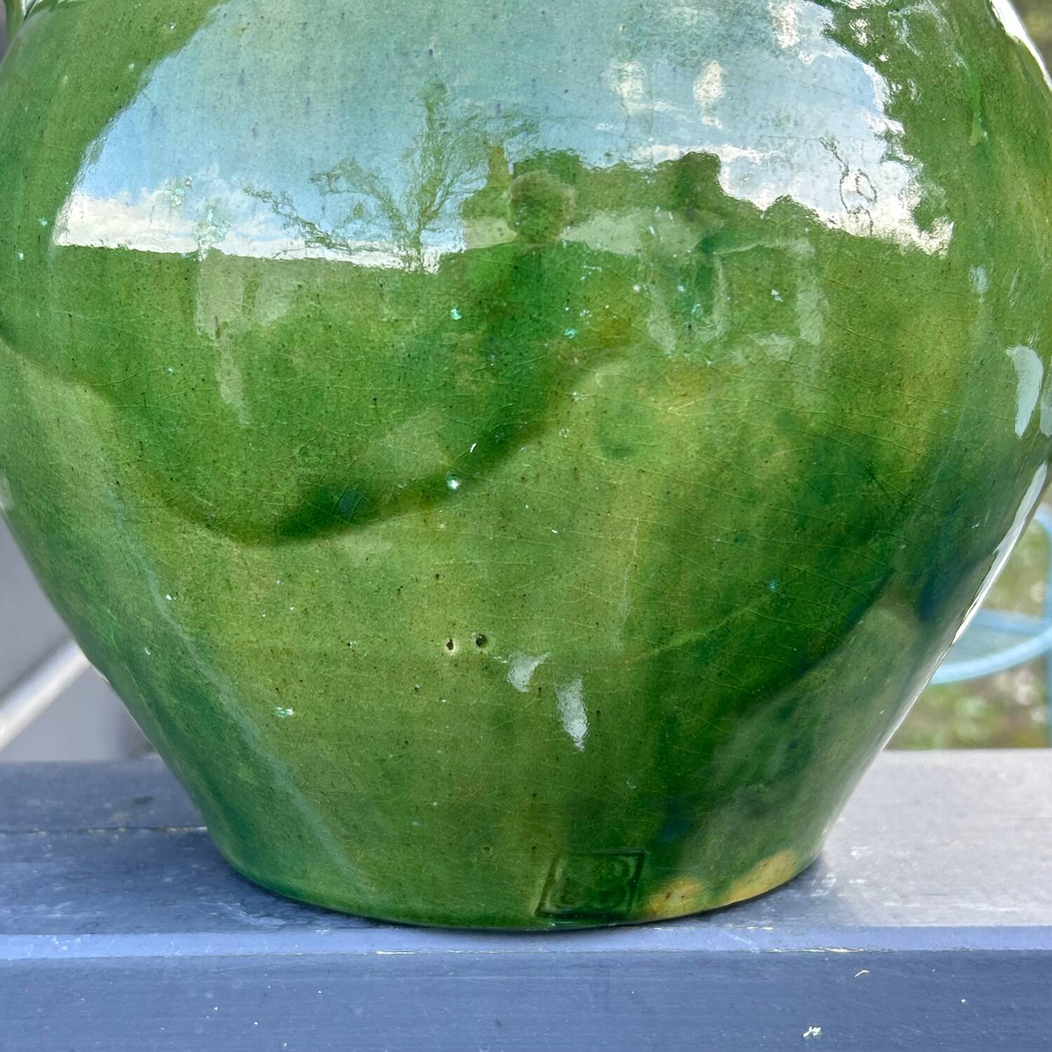 Large green enameled jar