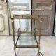 Rolling bar cart in brass and bronze circa 1960