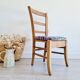 Antique upholstered wooden chair