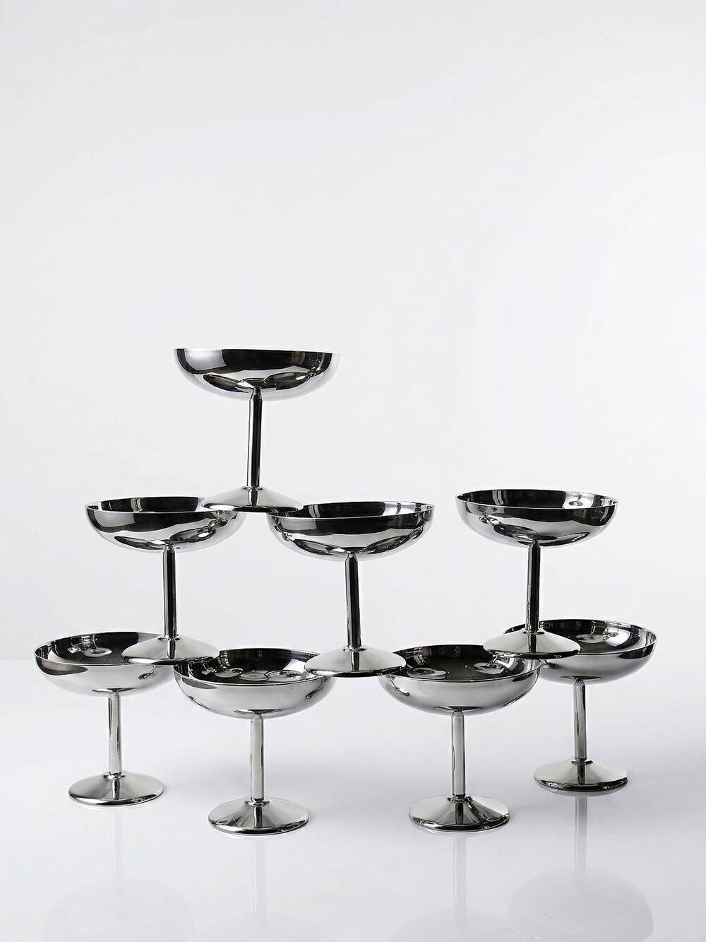 8 vintage dessert bowls on a pedestal in stainless steel in the style of Guy Degrenne.
