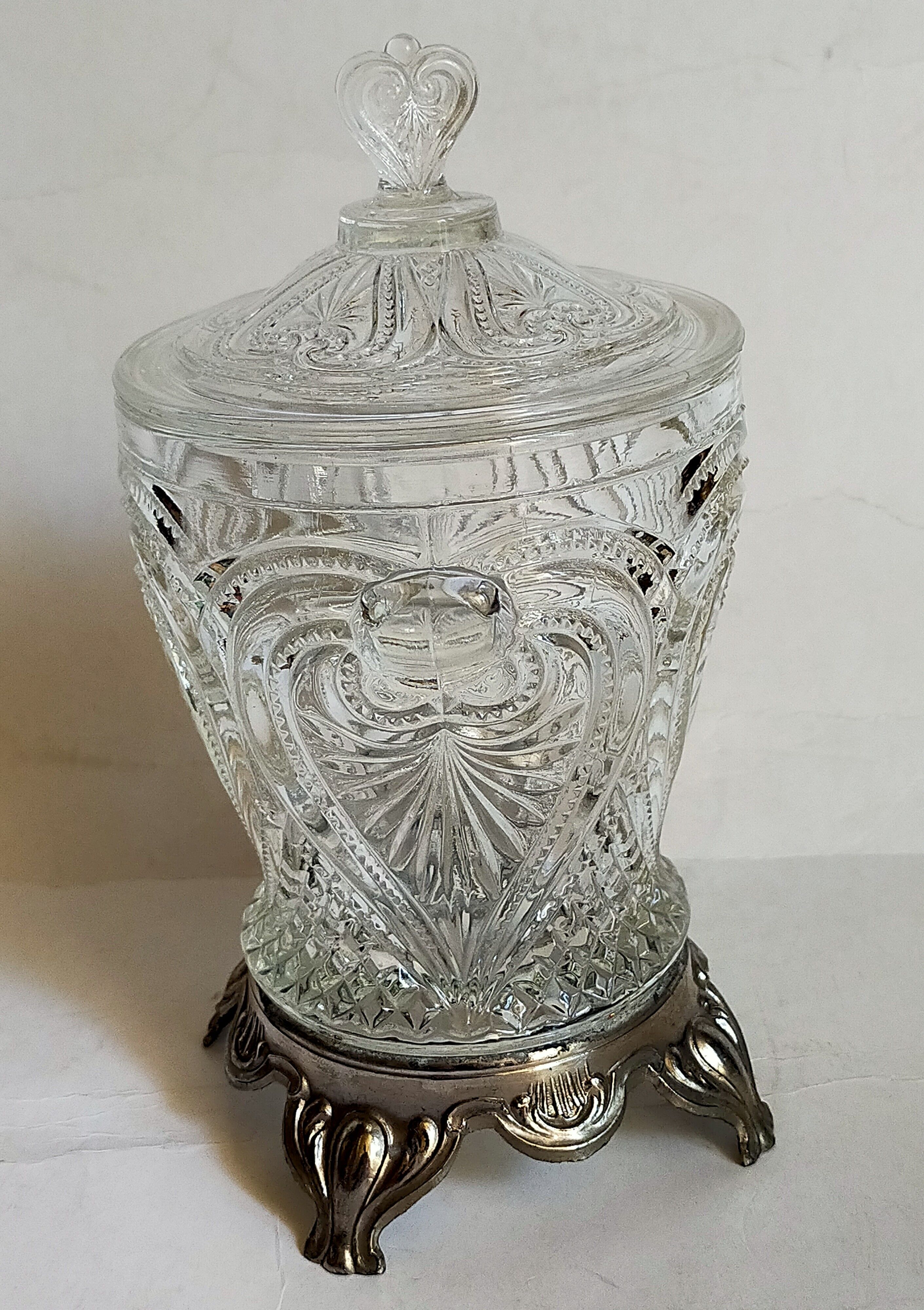 Antique glass compotier on metal stand