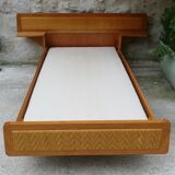 Wooden bed and rattan