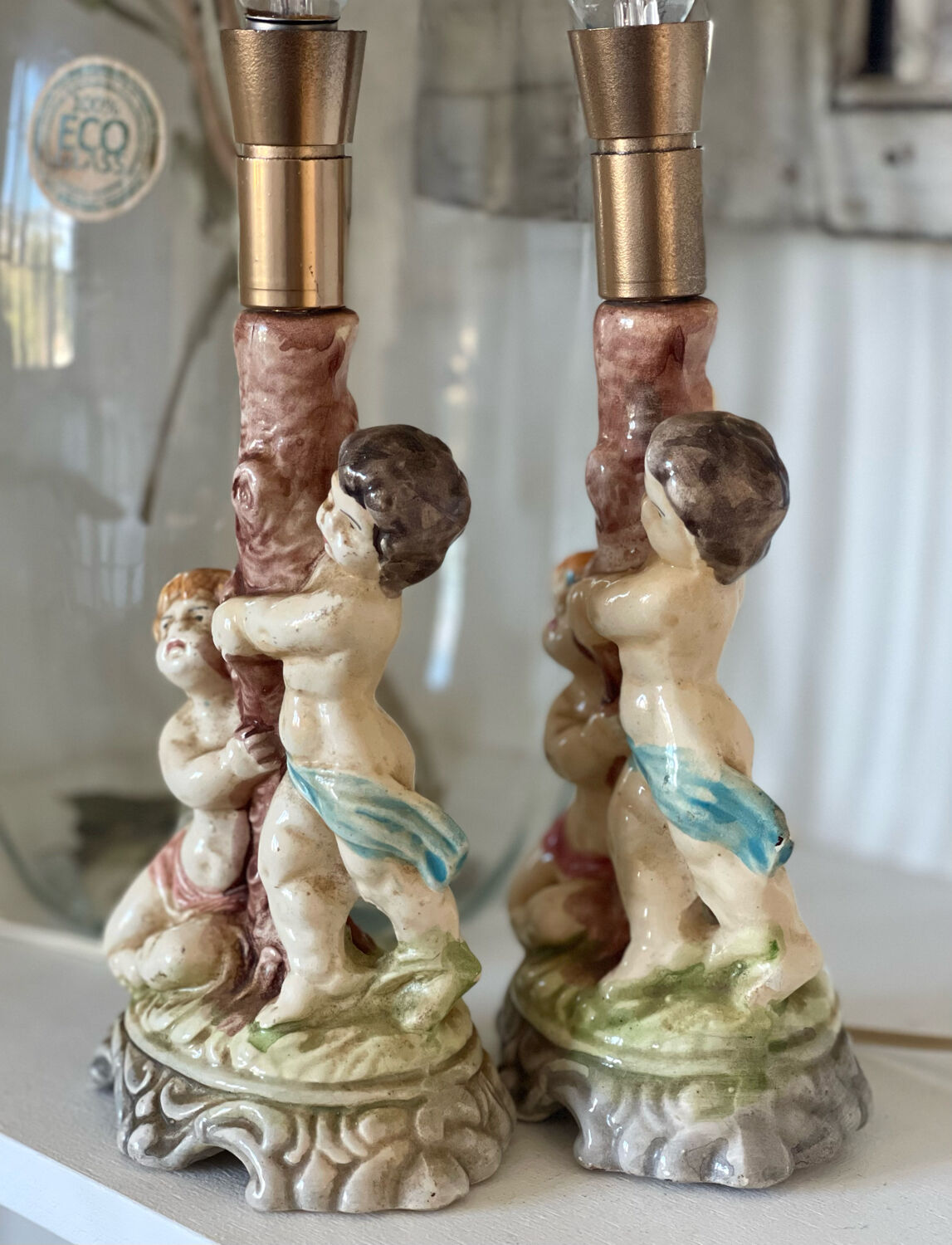 Duo of antique ceramic lamps.