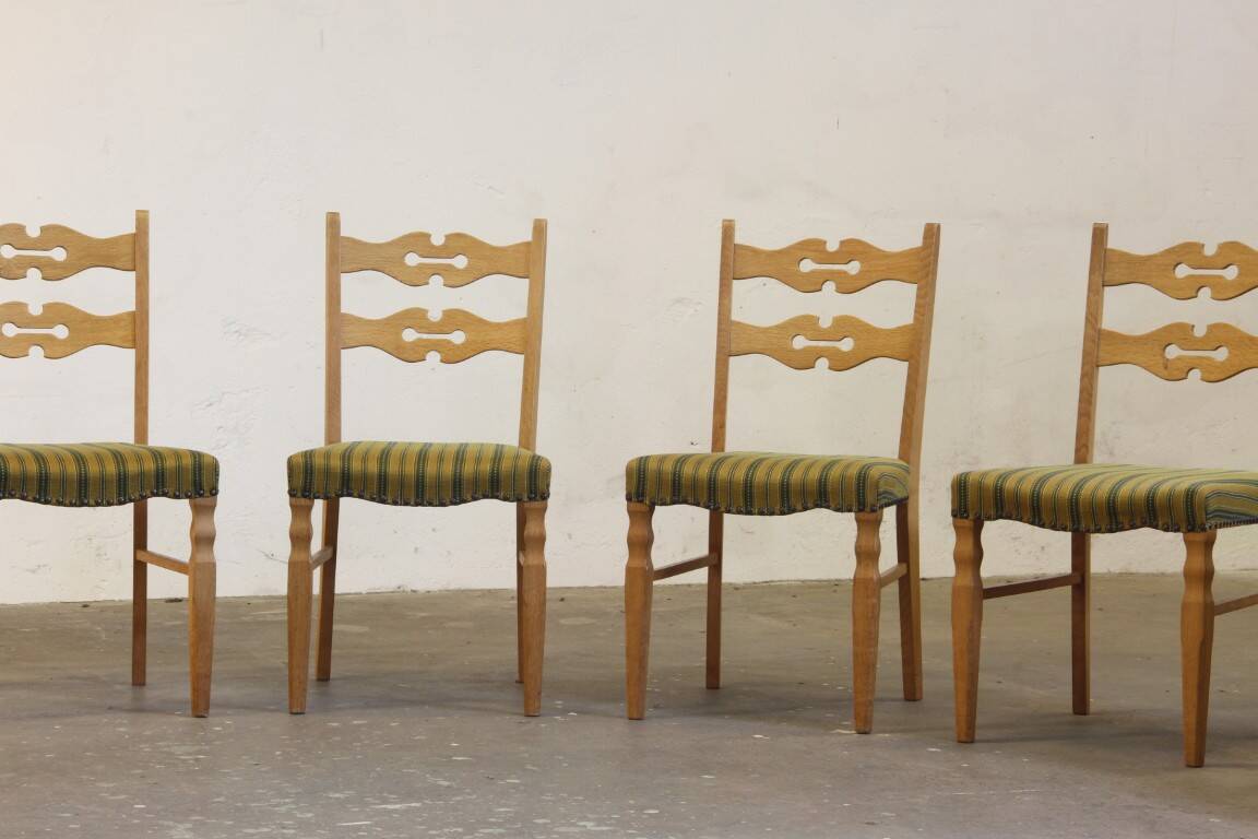 Vintage 1960s brutalist Danish modern oak dining chairs in the style of Henning Kjærnulf