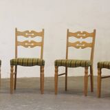 Vintage 1960s brutalist Danish modern oak dining chairs in the style of Henning Kjærnulf
