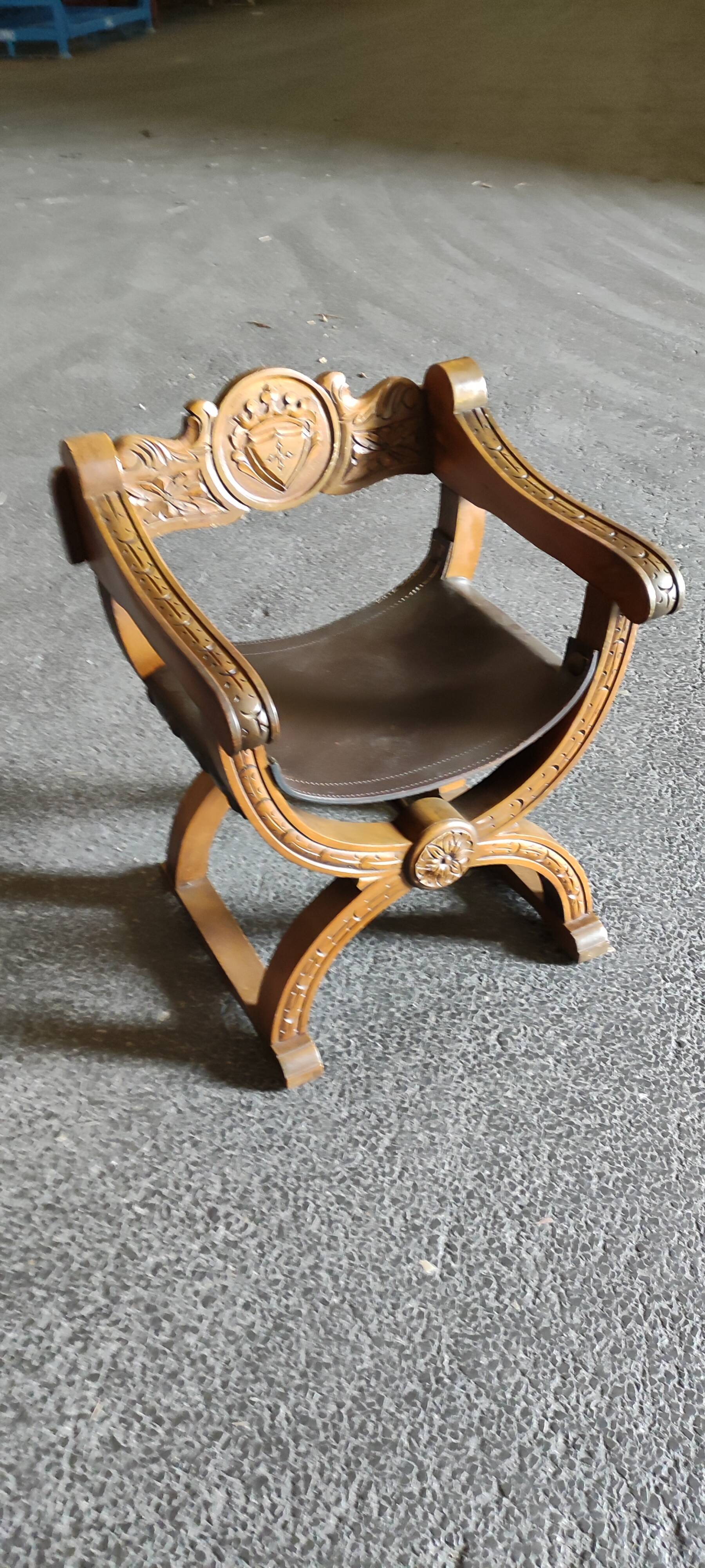 Armchair called Dagobert in wood and leather
