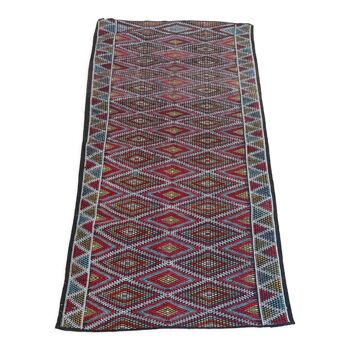 Handmade multicolored diamond patterned kilim rug in natural wool