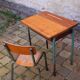 Vintage teak and solid oak schoolwork and its 50 year chair