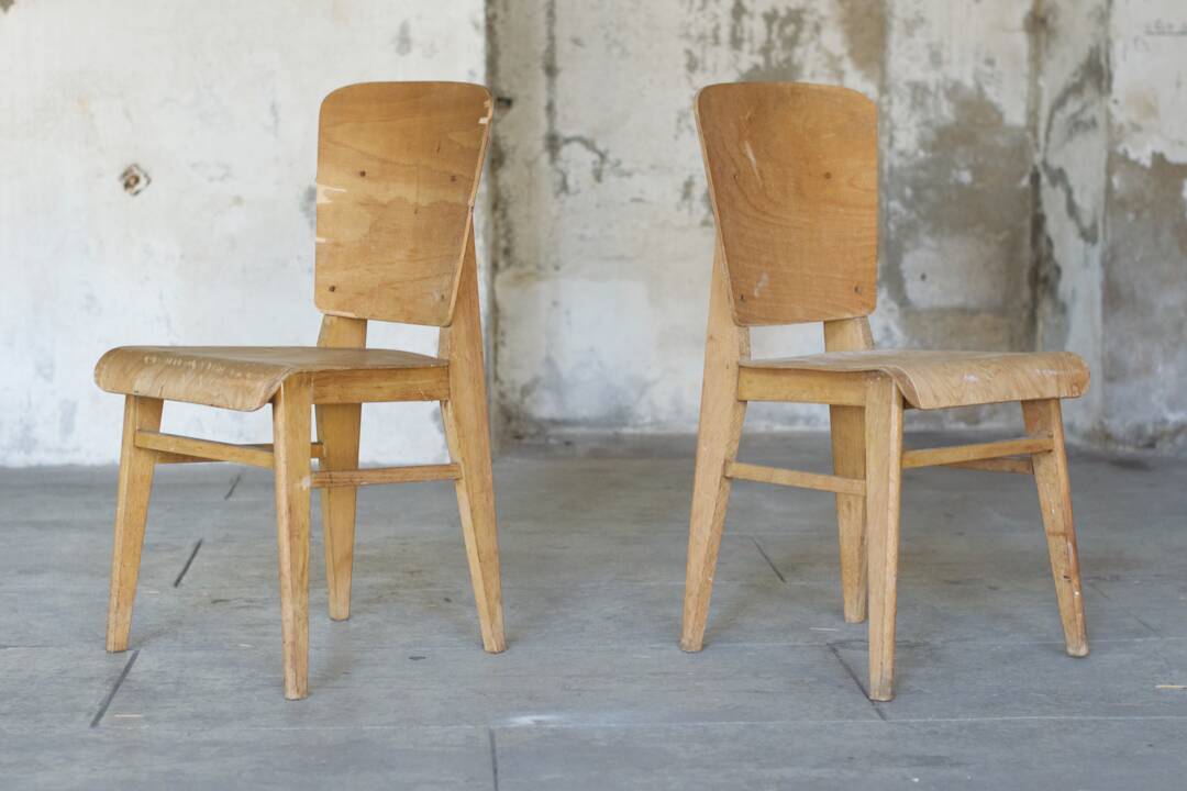 two  style wooden chairs