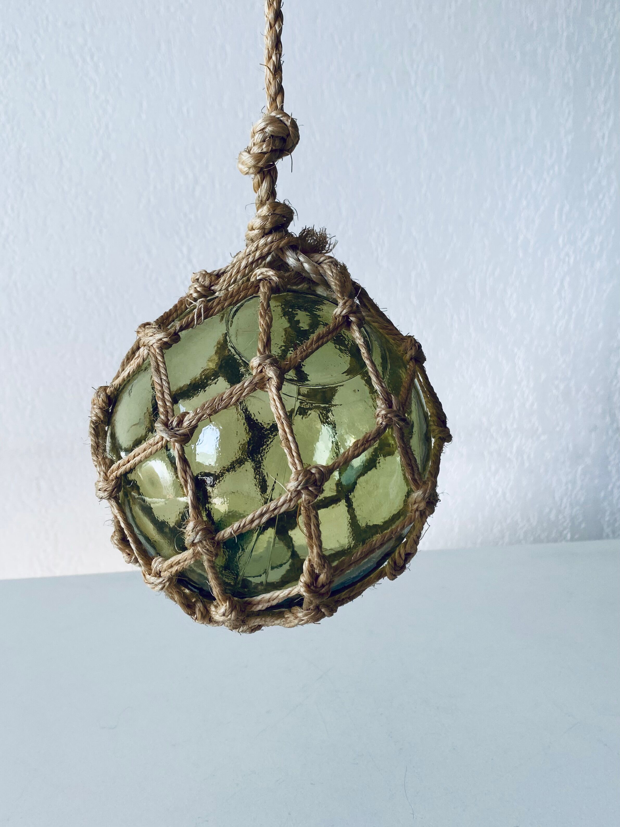 Antique fisherman's ball, old fishing floats