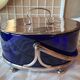 Silver-plated metal and blue glass biscuit jar