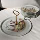 Porcelain cheese platter with 6 matching plates.