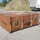 Old travel trunk made of wood and brass