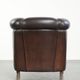 Dark sheepskin club armchair with unique design in English style