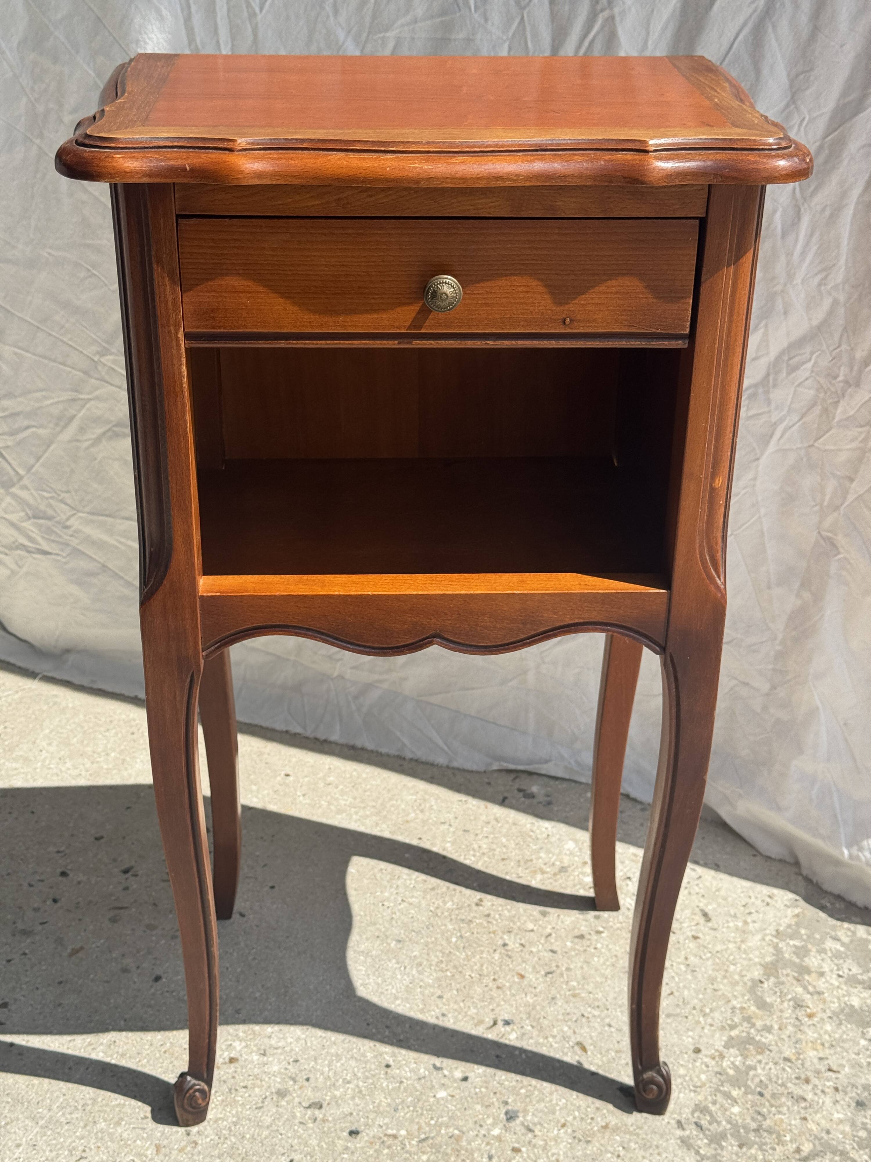 Classic wooden bedside table with drawer