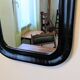 Miroir vintage noir aux angles arrondis