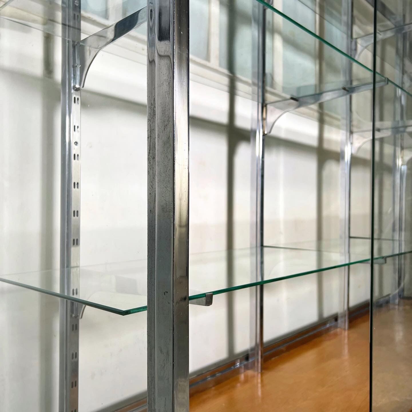 Glass & chrome showcase, 1980