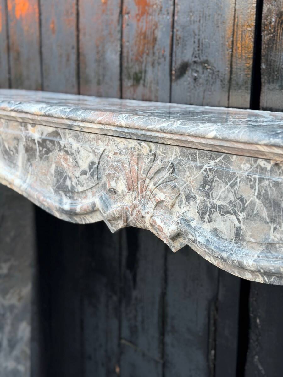 Regency-style fireplace in grey Ardennes marble from around 1900.