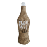 Glass and wicker bottle