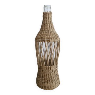 Glass and wicker bottle