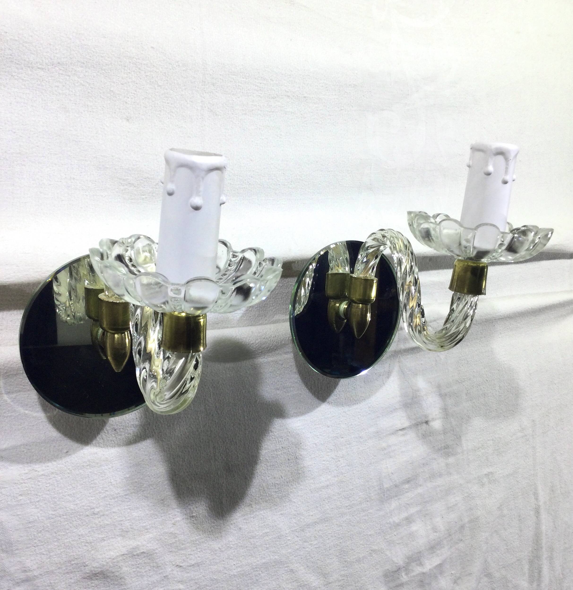 Pair of glass and mirror sconces