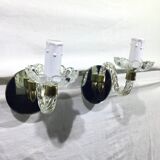 Pair of glass and mirror sconces