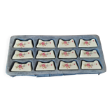 Set of 12 porcelain knife rests