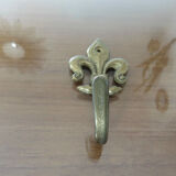 Brass "fleur de lys" hook 30-40s